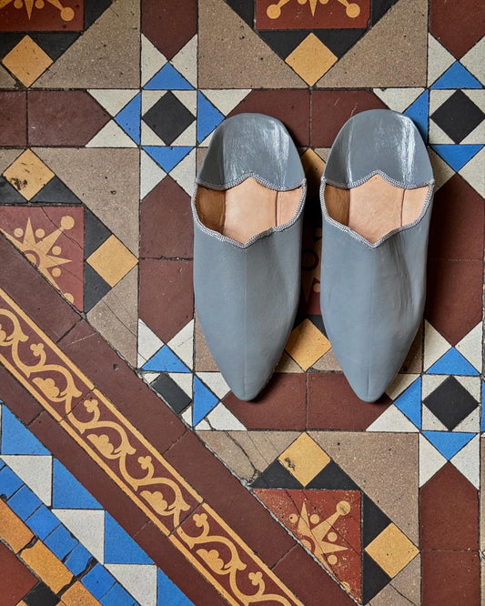 Morrocan leather Babouche  artisan made slippers on tiled floor.
