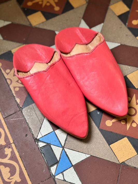 Morrocan leather Babouche artisan made slippers on tiled floor.