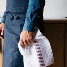 Andree Jardin sommelier chefs apron worn by a man
